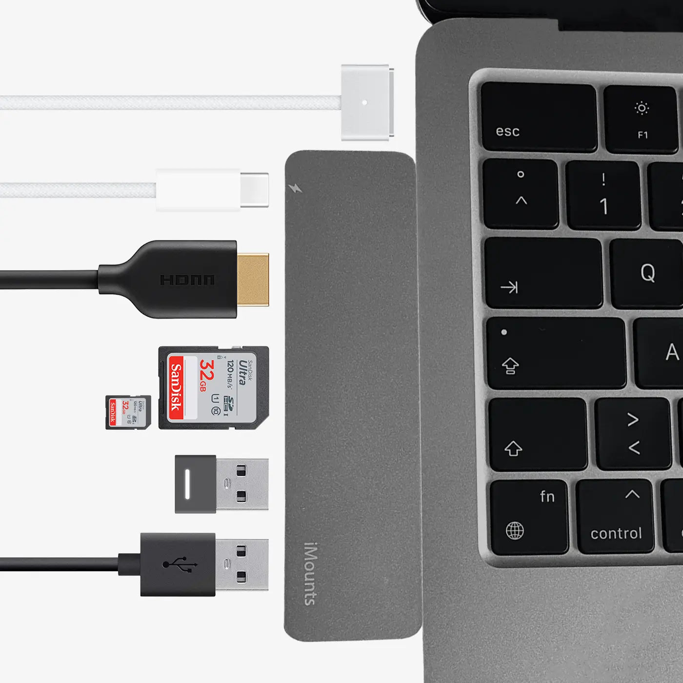 usb-c hub in macbook geklikt met kabels aangesloten
